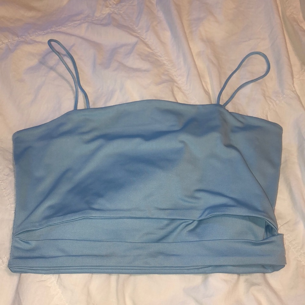 Light blue crop with stomach cutout
